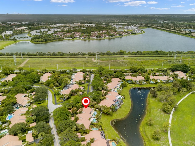 drone / aerial view featuring a water view