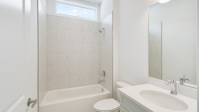 full bathroom with vanity, toilet, and tiled shower / bath combo