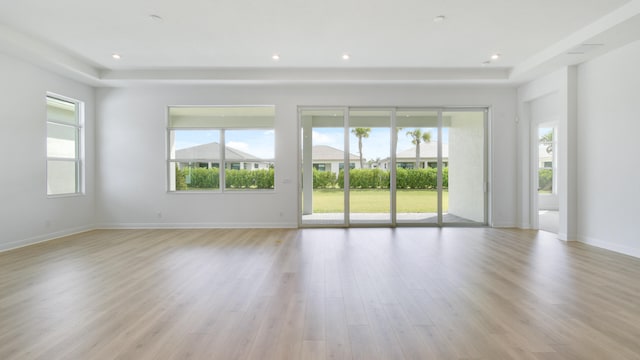 unfurnished room featuring light hardwood / wood-style floors