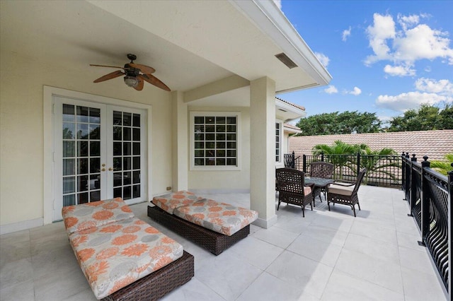 view of patio / terrace with ceiling fan and french doors