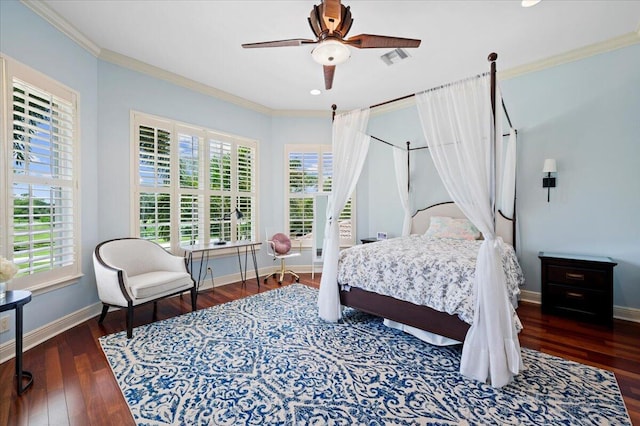 bedroom featuring ceiling fan, dark hardwood / wood-style flooring, and ornamental molding