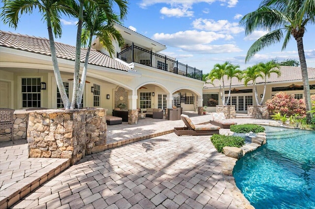 view of swimming pool featuring outdoor lounge area and a patio area