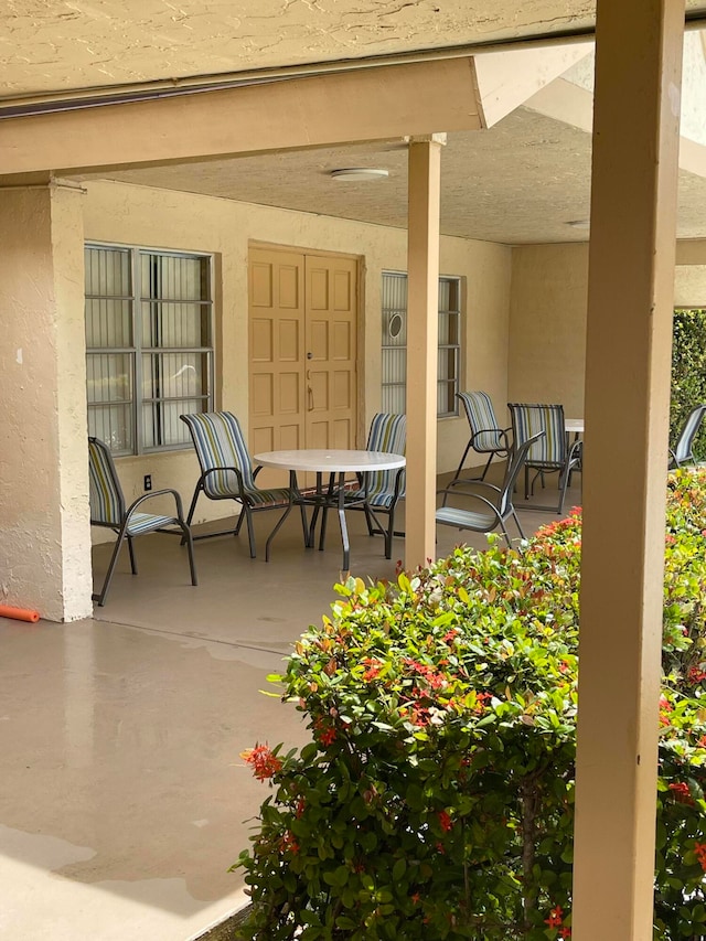 view of patio featuring a porch