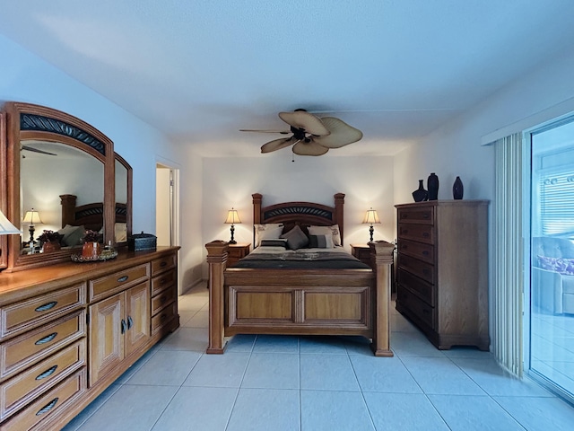 bedroom featuring light tile patterned floors, access to outside, and ceiling fan