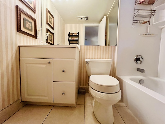 full bathroom with tile patterned floors, vanity,  shower combination, and toilet