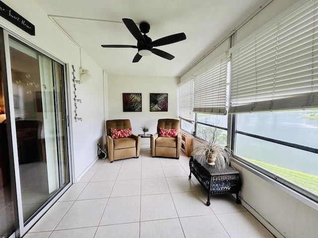 sunroom / solarium with ceiling fan