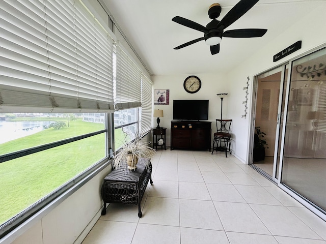 sunroom / solarium with ceiling fan