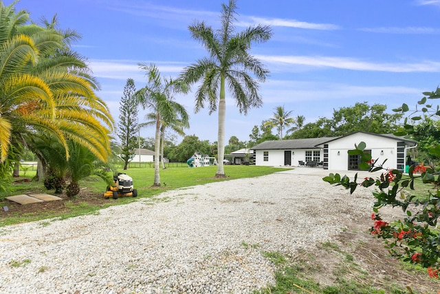 view of front of home featuring a front lawn