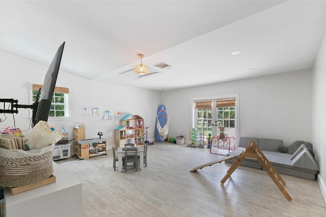 interior space featuring light hardwood / wood-style flooring and french doors