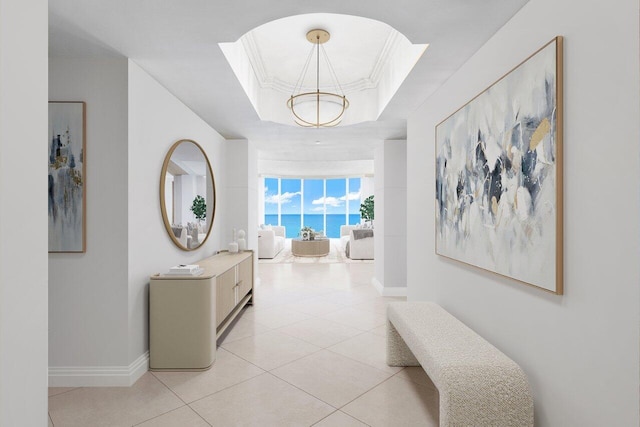 3740 S Ocean Blvd Unit 1708, Highland Beach, FL 33487 - dining area with a textured ceiling, a water view, and an inviting chandelier