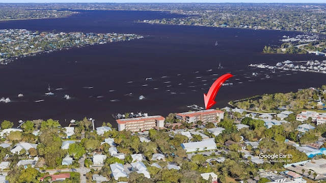 drone / aerial view with a water view