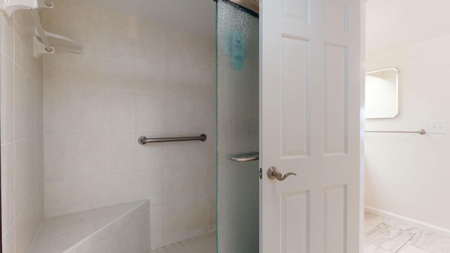 bathroom featuring a stall shower