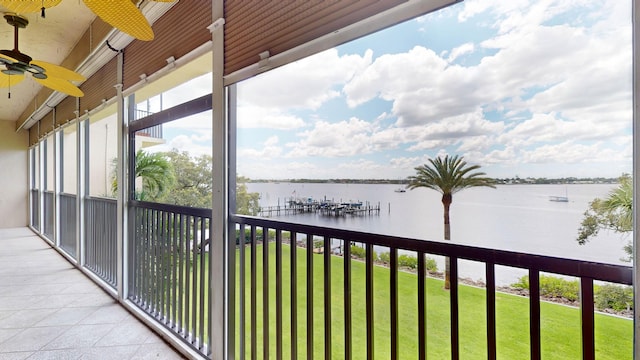 balcony featuring a water view