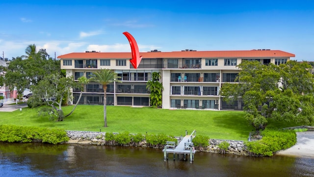 view of building exterior with a water view