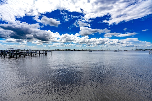 view of dock with a water view