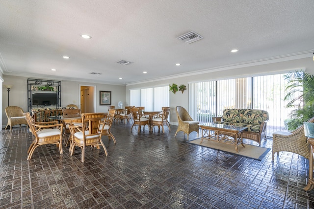 624 SW Saint Lucie Cres Unit 302, Stuart, FL 34994 - dining area featuring visible vents, recessed lighting, ornamental molding, and a healthy amount of sunlight