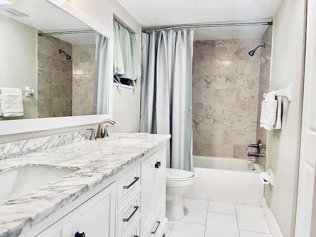 full bathroom featuring toilet, vanity, tile patterned floors, and shower / bathtub combination with curtain