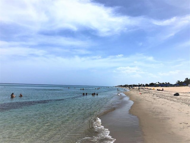 view of water feature with a beach view