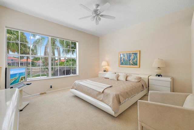 bedroom featuring carpet and ceiling fan