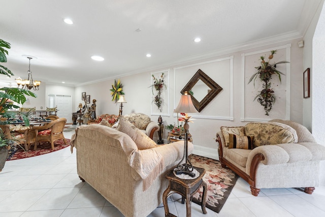 living room with crown molding, a chandelier, and light tile patterned floors