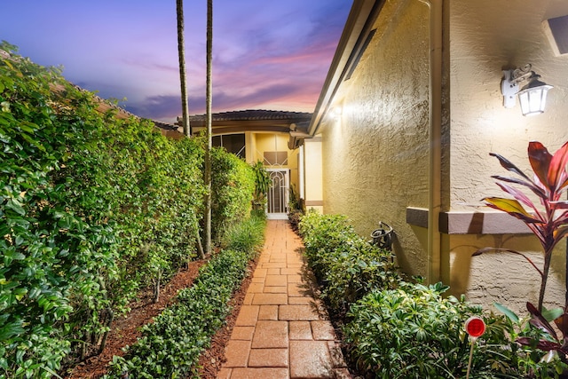 view of property exterior at dusk