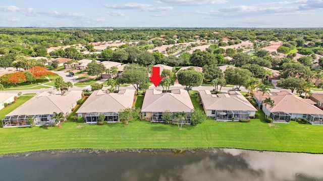 bird's eye view with a water view