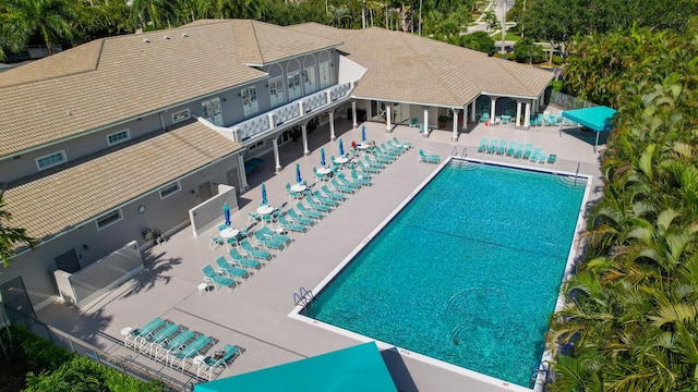 view of swimming pool featuring a patio area