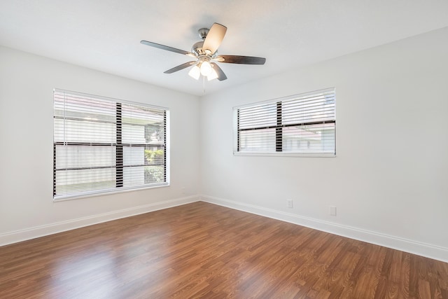 spare room with ceiling fan and hardwood / wood-style floors