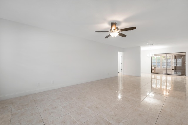 empty room featuring ceiling fan