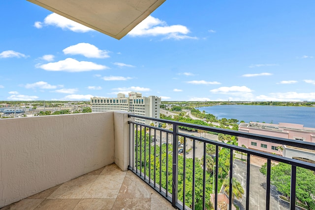 balcony featuring a water view