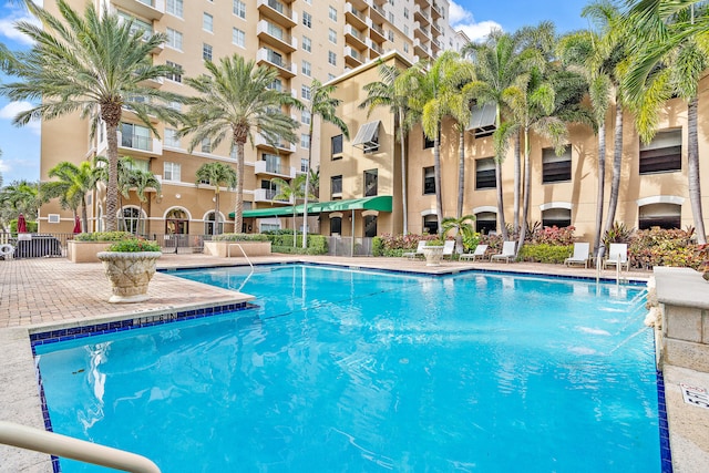 view of swimming pool featuring pool water feature