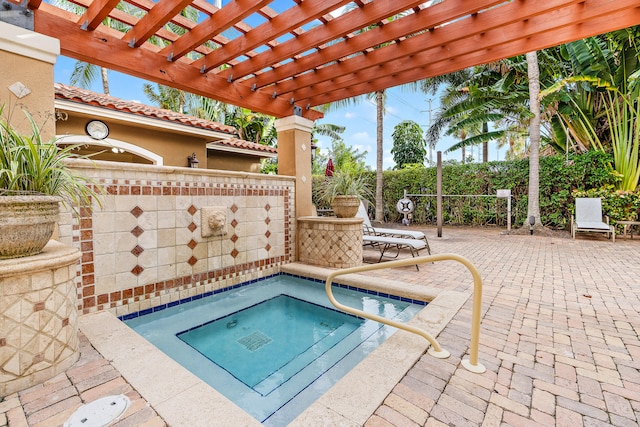 view of pool with a pergola and a patio