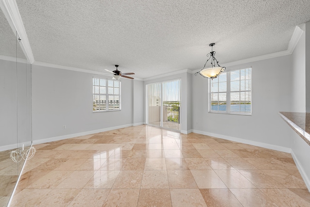 spare room featuring crown molding, ceiling fan, and light tile patterned floors