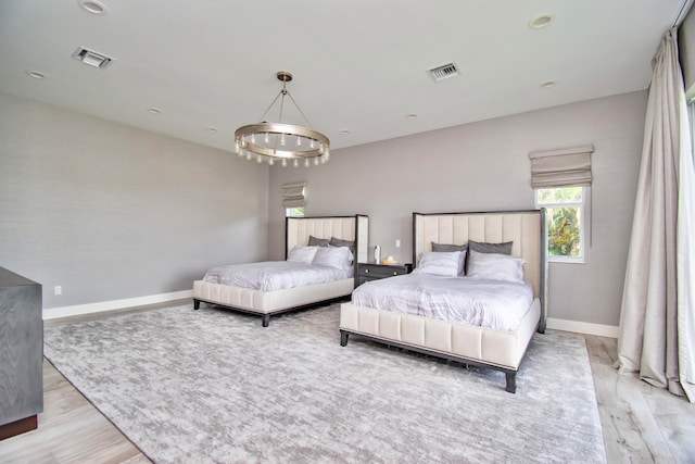 bedroom with light hardwood / wood-style flooring