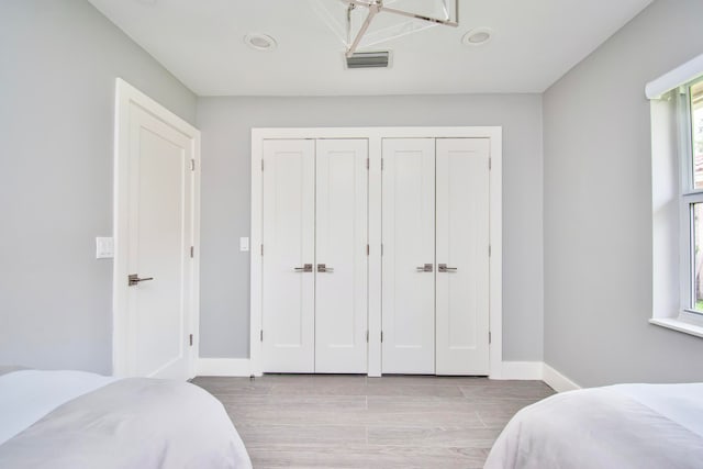 bedroom featuring light hardwood / wood-style flooring