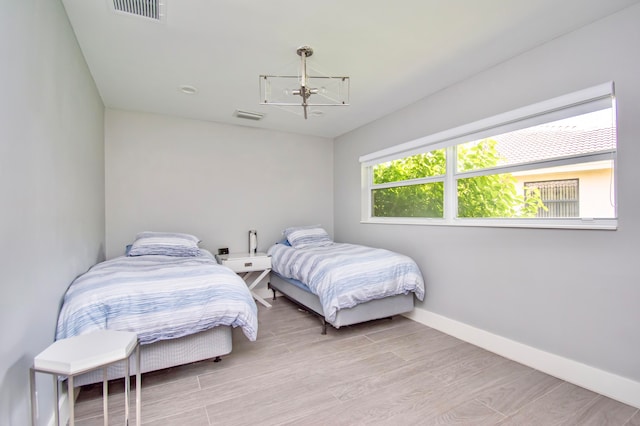 bedroom featuring light wood-type flooring