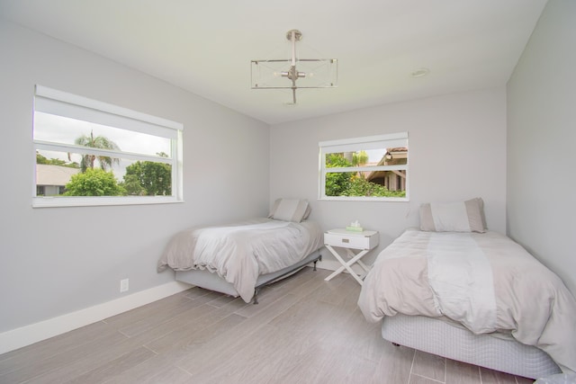 bedroom with wood-type flooring