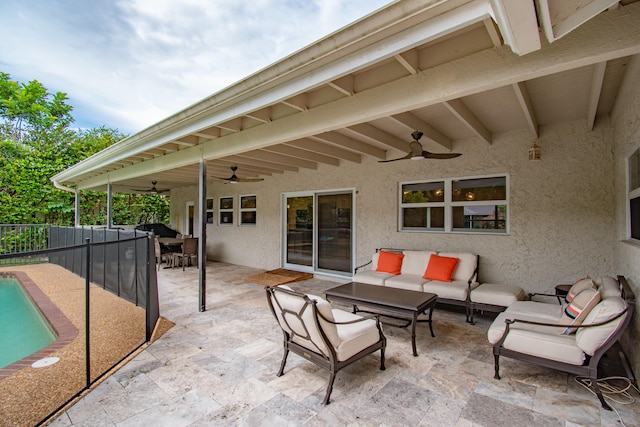 view of patio featuring ceiling fan and an outdoor hangout area