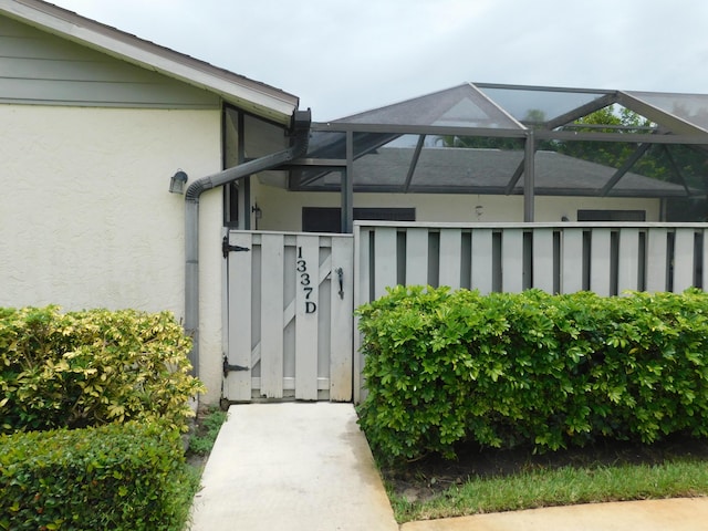 view of property exterior featuring a lanai