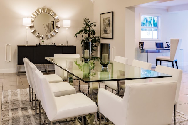 dining space featuring light tile patterned floors