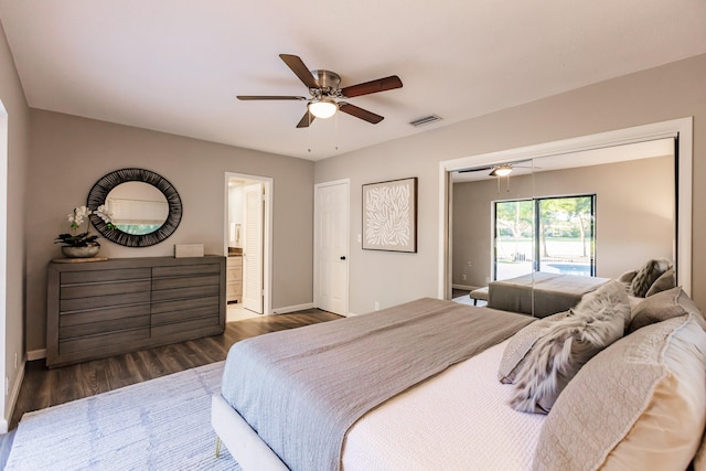 bedroom with access to exterior, dark hardwood / wood-style floors, and ceiling fan