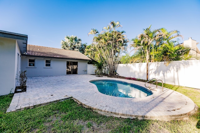 view of pool featuring a patio area