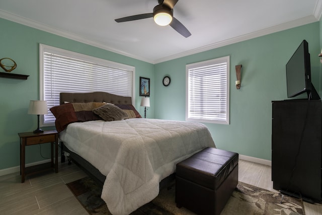 bedroom with ceiling fan, light hardwood / wood-style flooring, and crown molding