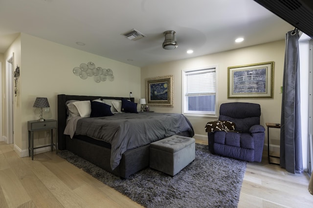 bedroom featuring ceiling fan and light wood-type flooring