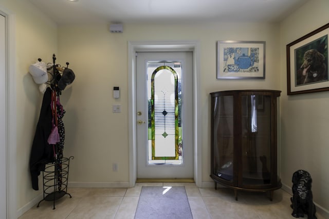 tiled foyer entrance featuring a healthy amount of sunlight