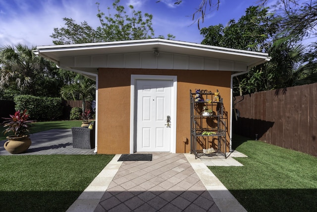 view of outdoor structure featuring a yard