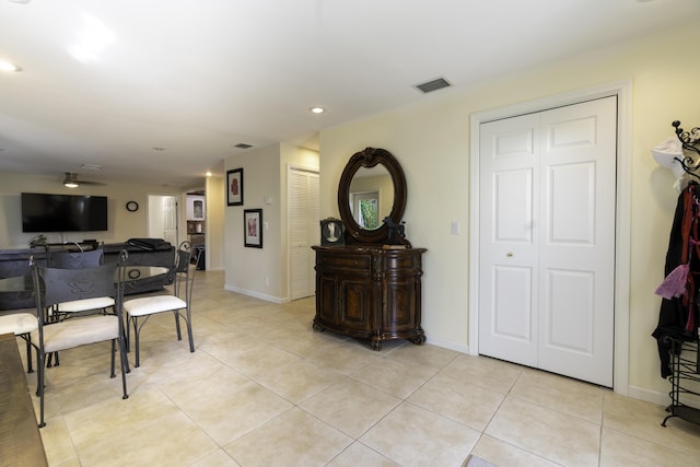 interior space featuring light tile patterned floors