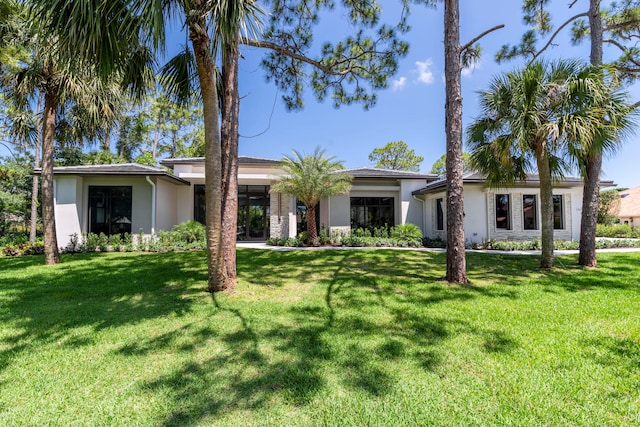 view of front of home with a front yard