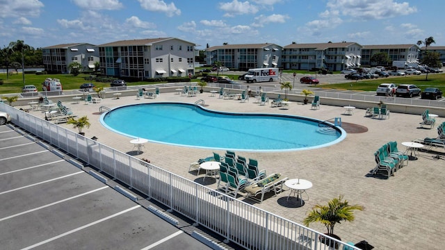 view of swimming pool featuring a patio