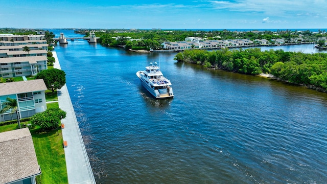 drone / aerial view featuring a water view